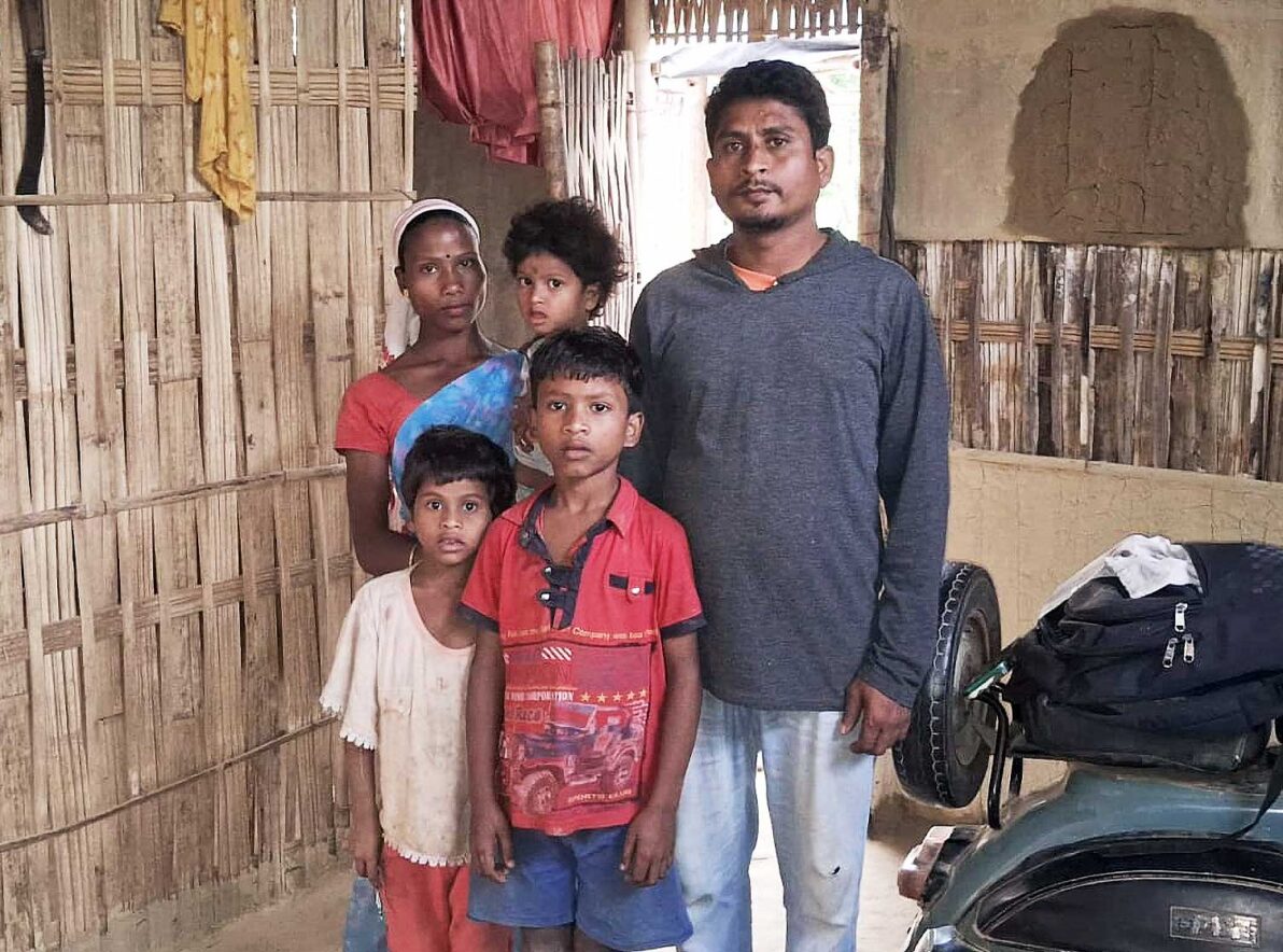 rural family in bamboo home